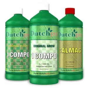 Drie flessen Dutchpro plantenvoeding: Bloom, Grow, Calmag.